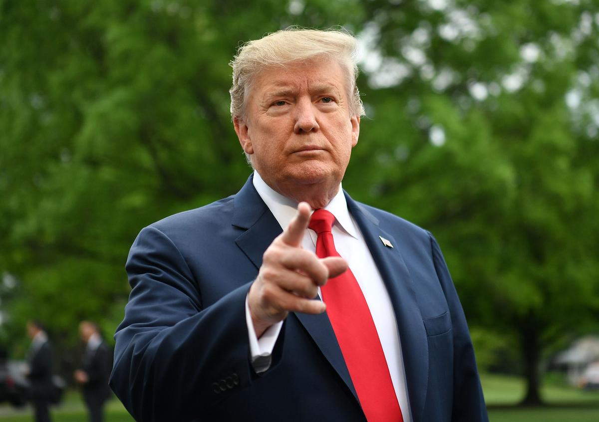 President Donald Trump speaks to reporters before boarding Marine One from the South Lawn of the White House on April 26, 2019. (Mandel Ngan/AFP/Getty Images)