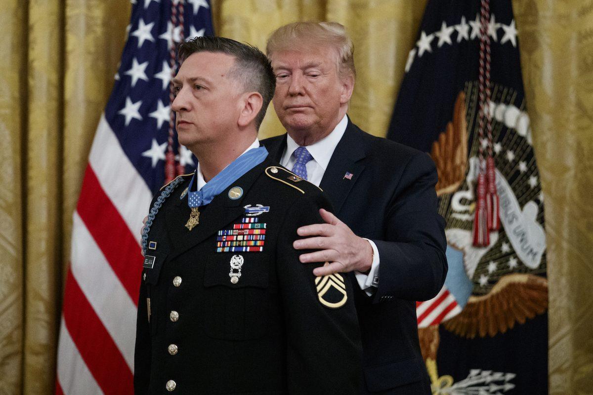 President Donald Trump awards the Medal of Honor to Army Staff Sgt. David Bellavia in the East Room of the White House, on June 25, 2019. (Carolyn Kaster/AP Photo)