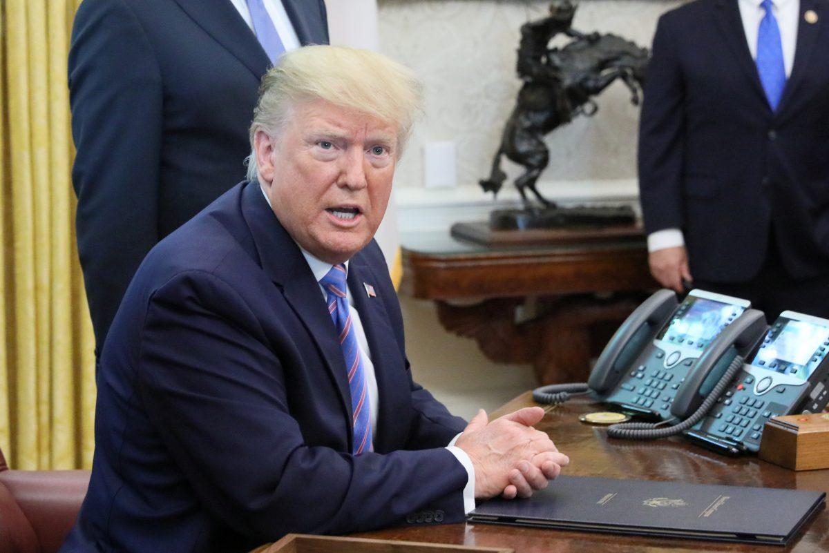 President Donald Trump speaks while participating in a border funding legislation signing ceremony in the Oval Office of the White House on July 1, 2019. (Jonathan Ernst/Reuters)