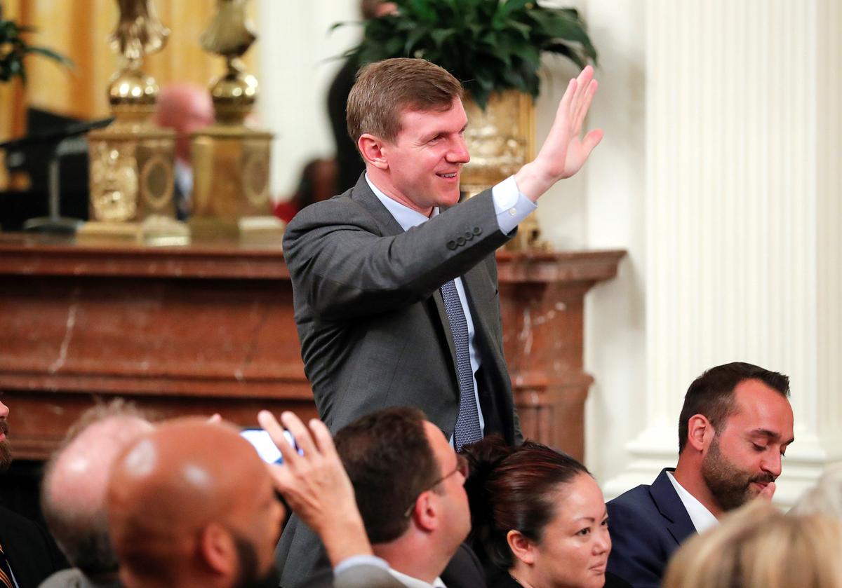 Project Veritas founder and CEO James O'Keefe waves as President Donald Trump speaks during a social media summit meeting in the East Room of the White House in Washington, on July 11, 2019. (Reuters/Carlos Barria)