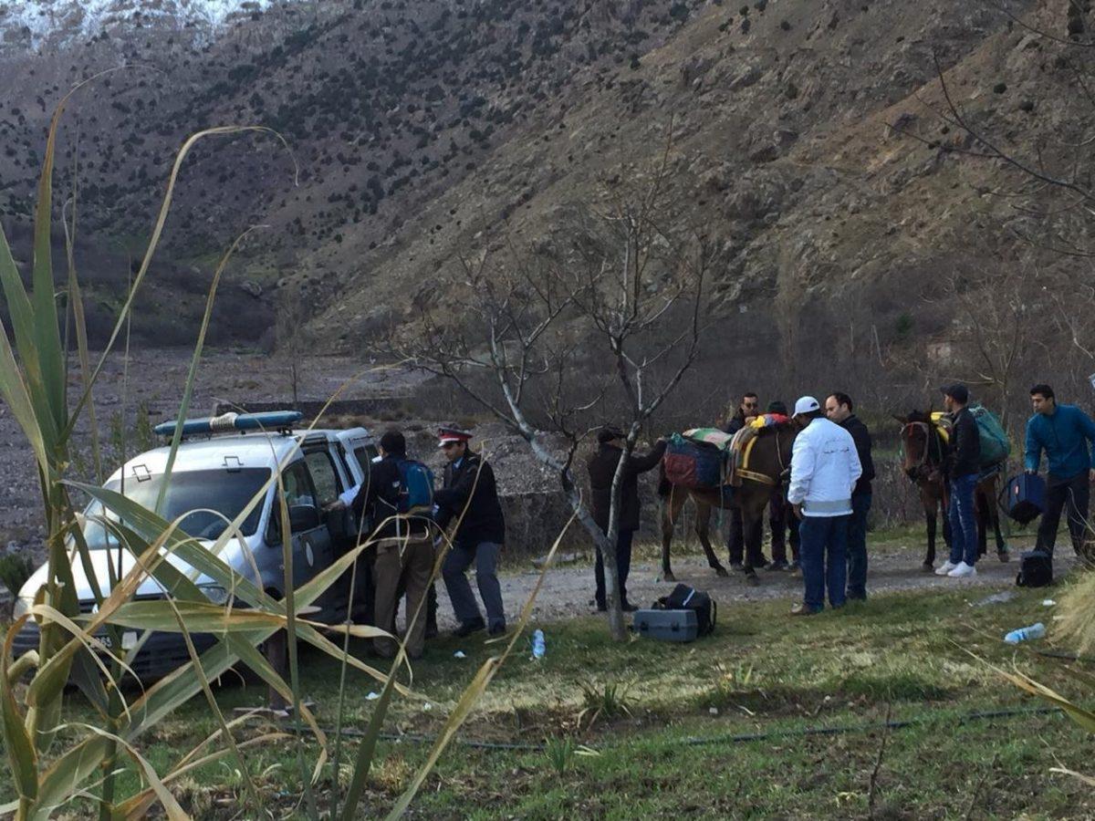 In this photo provided by Moroccan news channel 2M and taken on Tuesday, Dec. 18, 2018, a security team is seen at the area where the bodies of two Scandinavian women tourists were found dead, near Imlil in the High Atlas mountains, Morocco. The lone suspect arrested in the killing of two female Scandinavian tourists is connected to a terrorist group, and three other suspects are on the run, Moroccan prosecutors said Wednesday. (2M via AP)