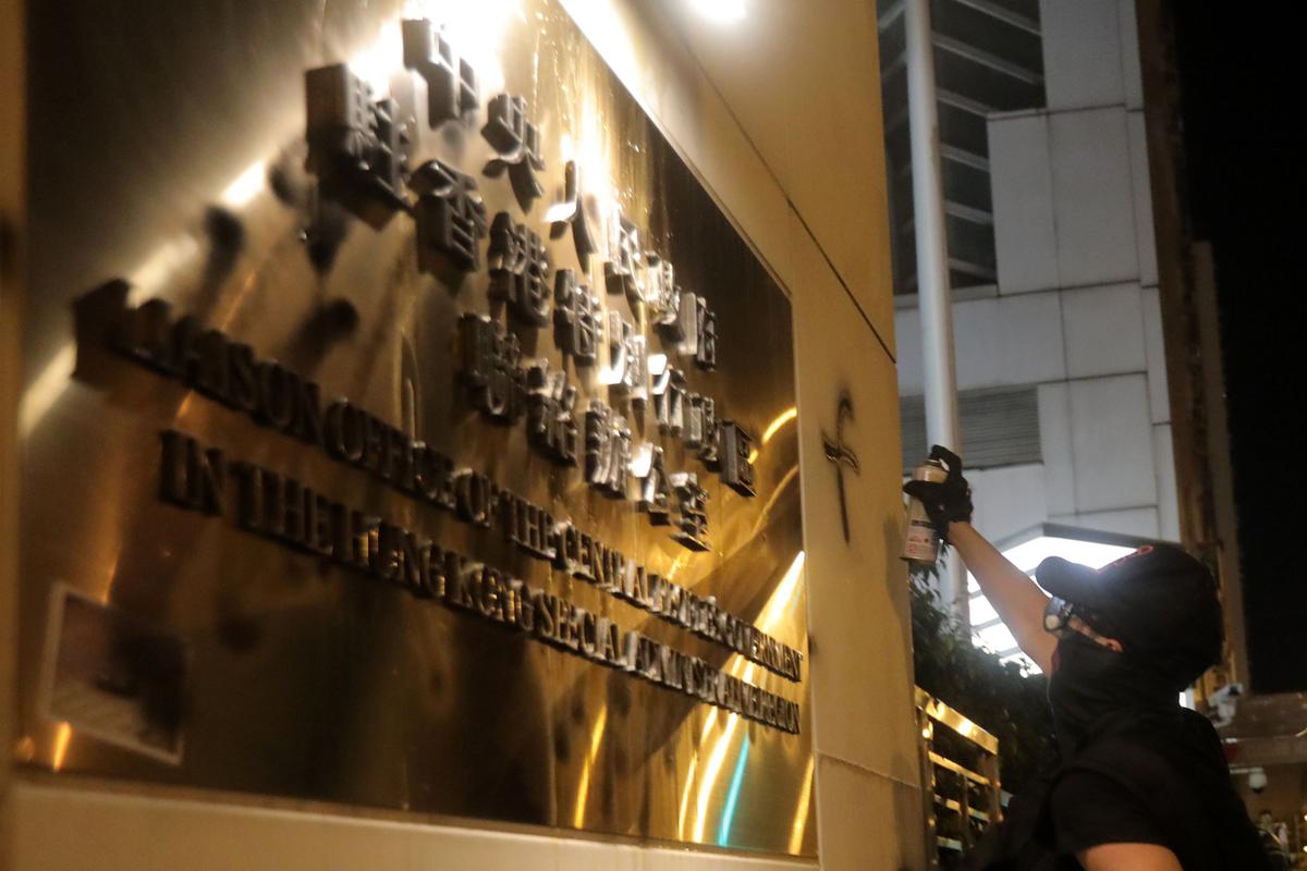 In Direct Challenge, Hong Kong Protesters Deface Beijing’s Representative Office