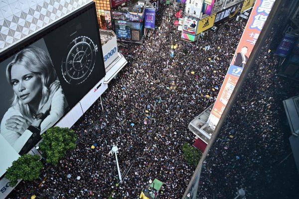 Protesters march against a controversial extradition bill in Hong Kong on July 21, 2019. (ANTHONY WALLACE/AFP/Getty Images)