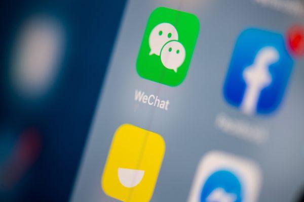 An illustration picture showing the logo of the Chinese instant messaging application WeChat on the screen of a tablet, on July 24, 2019. (Martin Bureau/AFP/Getty Images)