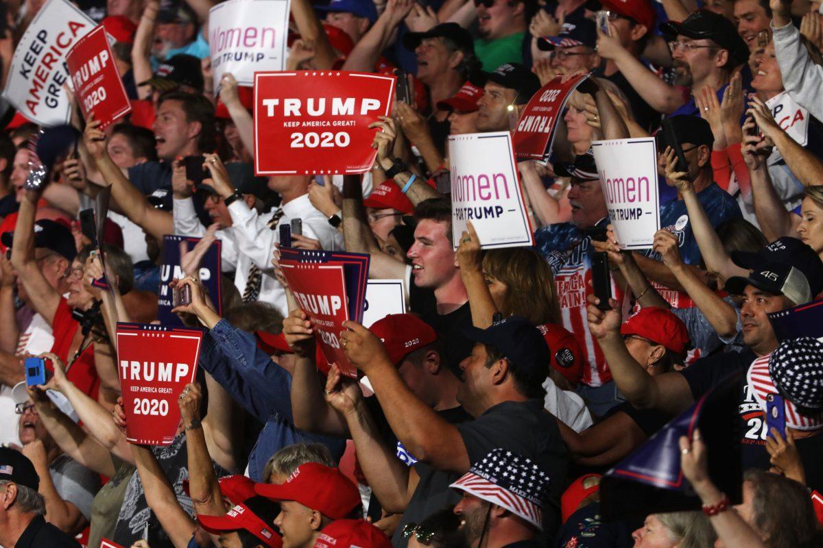 People cheer as President Donald Trump speaks to supporters at a rally in Manchester, New Hampshire, on Aug. 15, 2019. (Spencer Platt/Getty Images)