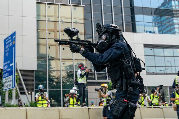 Riot police fire rubber bullet at protesters in Kowloon Bay, Hong Kong, on Aug. 24, 2019. (Anthony Kwan/Getty Images)