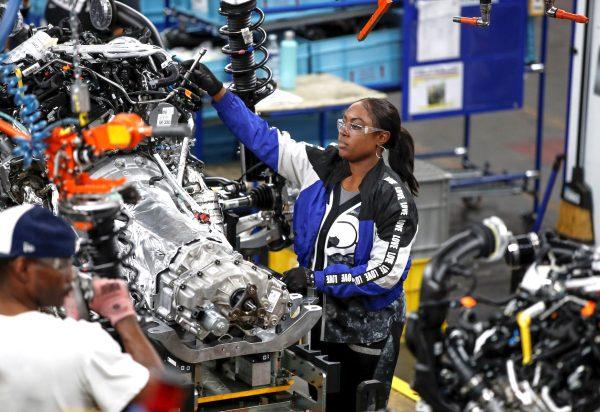 Workers build the 2020 Ford Explorer at Ford's Chicago Assembly Plant in Chicago, Ill., on June 24, 2019. (Reuters/Kamil Krzaczynski)