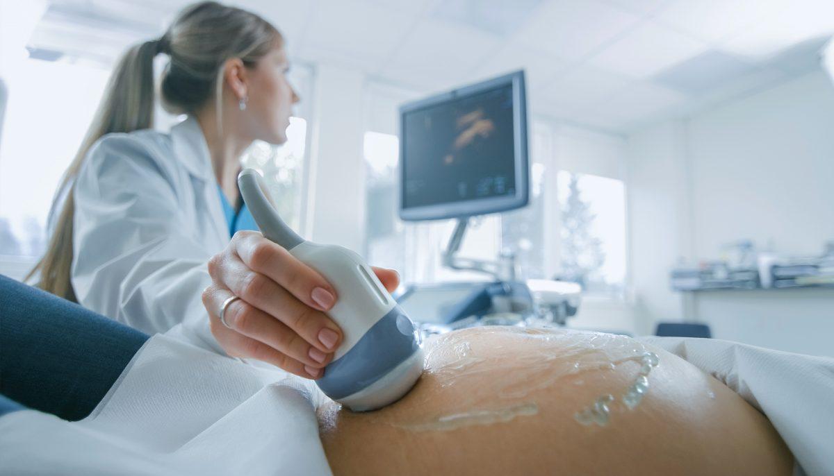 An ultrasound is performed in an illustration photograph. (Illustration - Shutterstock)