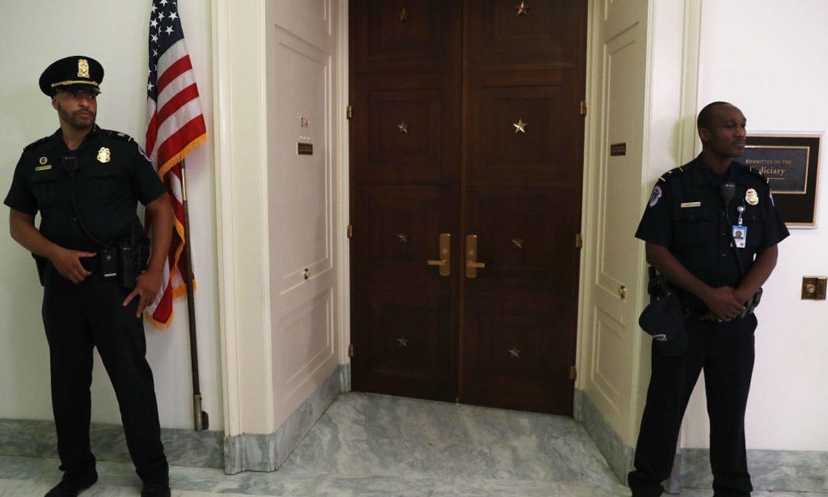 U.S. Capitol Police stand guard outside of a House Judiciary Committee markup in Washington, on Sept. 12, 2019. (Mark Wilson/Getty Images)