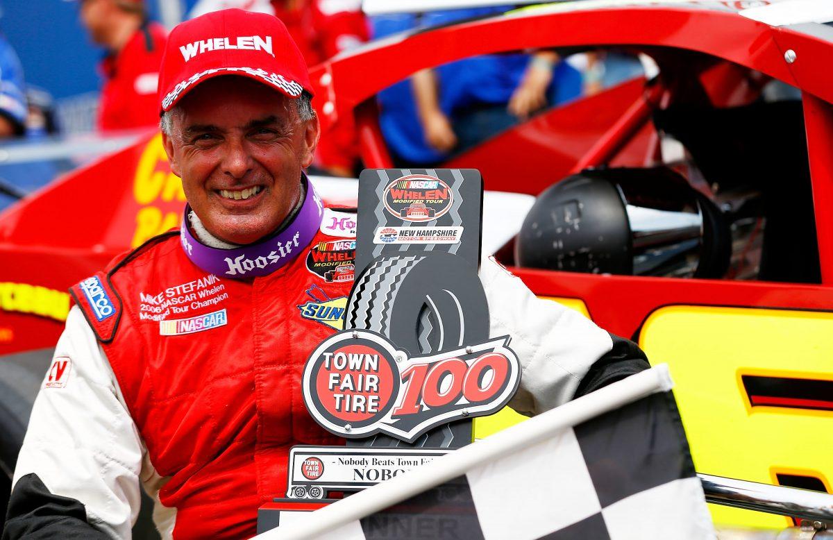 Mike Stefanik, a NASCAR legend, in a 2012 file photo after winning the NASCAR Whelen Modified Tour Town Fair Tire 100 at New Hampshire Motor Speedway. (Jared Wickerham/Getty Images for NASCAR)