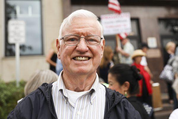 Local resident Fred Kelly, attends a rally against sanctuary policies that shield illegal aliens from federal authorities, in Montgomery County, Md., on Sept. 13, 2019. (Charlotte Cuthbertson/The Epoch Times)