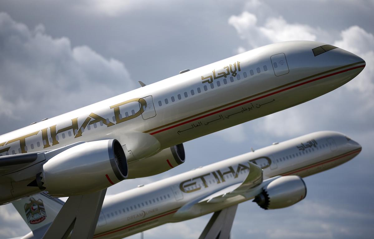 Large scale models of Etihad Boeing 787 Dream Liners are displayed near Terminal Four at Heathrow Airport in London, England, on Aug. 11, 2014. (Peter Macdiarmid/Getty Images)