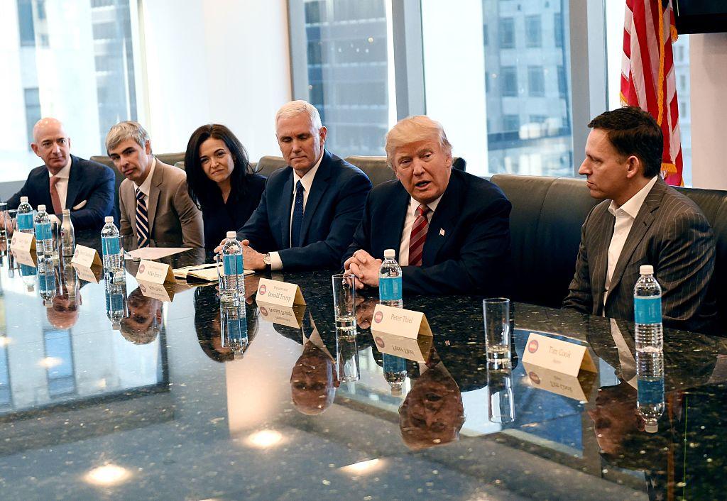 (L-R) Amazon's chief Jeff Bezos, Larry Page of Alphabet, Facebook COO Sheryl Sandberg, Vice President-elect Mike Pence, President-elect Donald Trump and Peter Thiel, co-founder and former CEO of PayPal at during meetings at Trump Tower in New York December 14, 2016. (Timothy A. Clary/AFP/Getty Images)