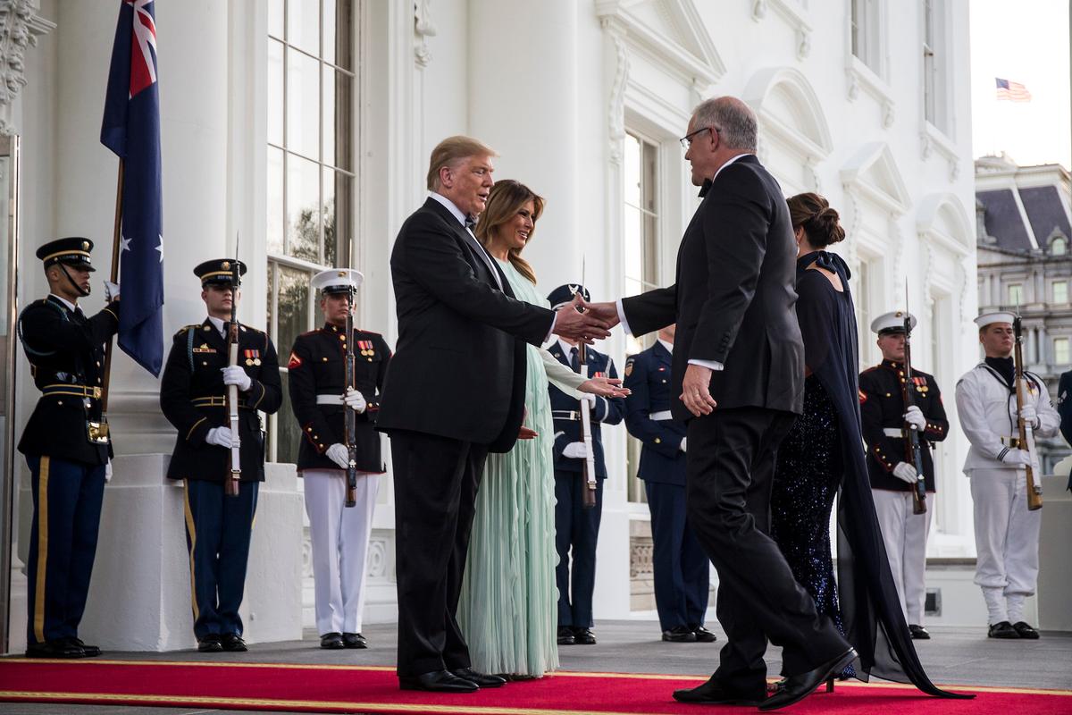 U.S. President Donald Trump and First Lady Melania Trump greet Australian Prime Minister Scott Morrison and Australian First Lady Jennifer Morrison ahead of a state dinner at the White House in Washington on Sept. 20, 2019. (Zach Gibson/Getty Images)