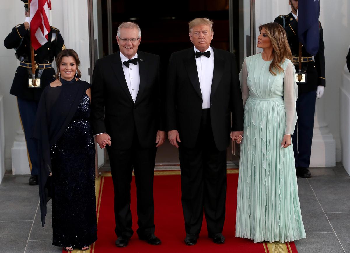 U.S. President Donald Trump and first lady Melania Trump welcome Australian Prime Minister Scott Morrison and his wife Jenny Morrison to an official dinner at the White House in Washington, on Sept. 20, 2019. (Win McNamee/Getty Images)
