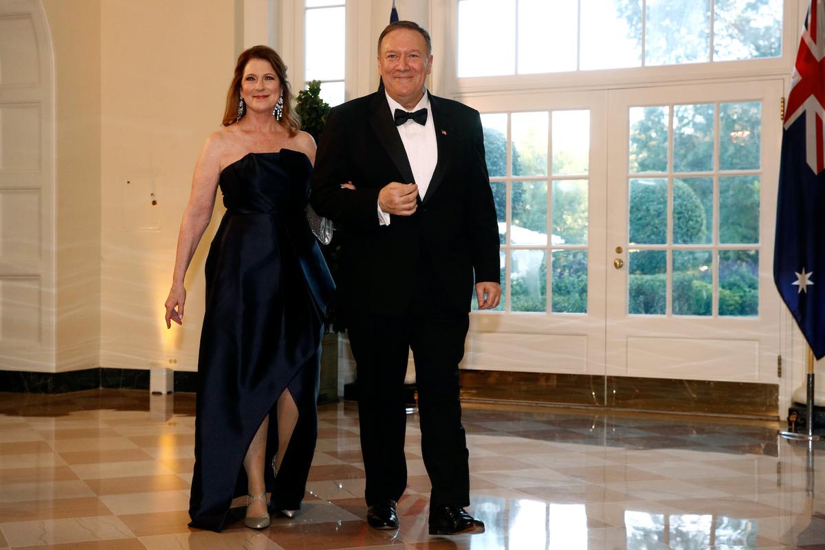 Secretary of State Mike Pompeo, right, and wife Susan Pompeo arrive for a State Dinner with Australian Prime Minister Scott Morrison and President Donald Trump at the White House,in Washington on Sept. 20, 2019. (AP Photo/Patrick Semansky)