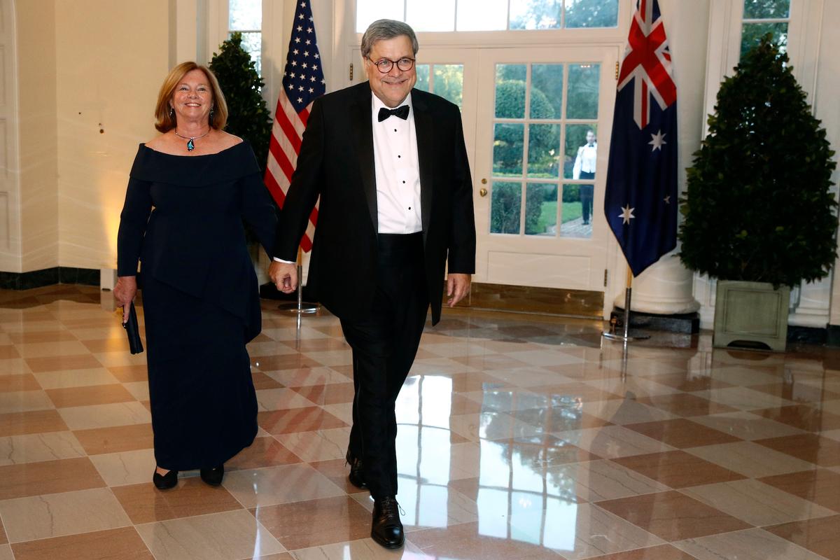 Attorney General William Barr, right, and wife Christine Barr arrive for a State Dinner with Australian Prime Minister Scott Morrison and President Donald Trump at the White House, in Washington on Sept. 20, 2019. (AP Photo/Patrick Semansky)