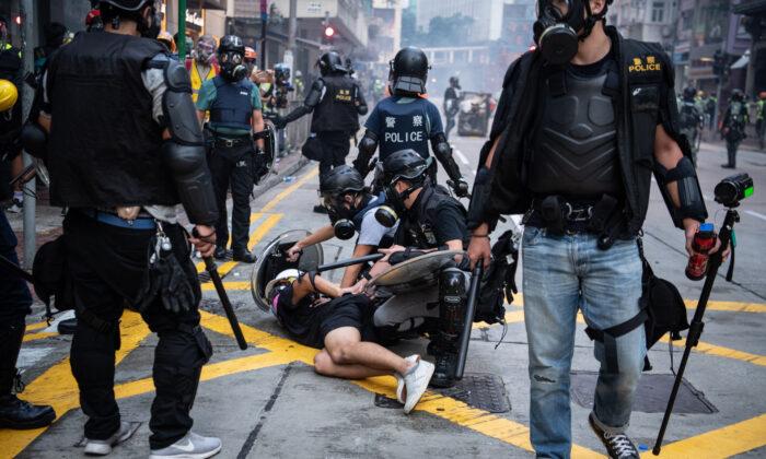 Hong Kong Protests Intensify on Regime’s Founding Anniversary, With Live Rounds, Tear Gas Fired