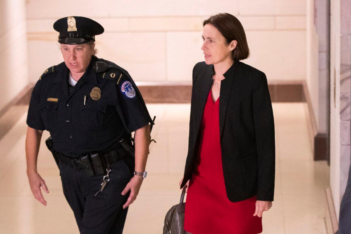 Former White House adviser on Russia Fiona Hill arrives on Capitol Hill in Washington on Oct. 14, 2019, as she is scheduled to testify before congressional lawmakers as part of the House impeachment inquiry into President Donald Trump. (AP Photo/Manuel Balce Ceneta)