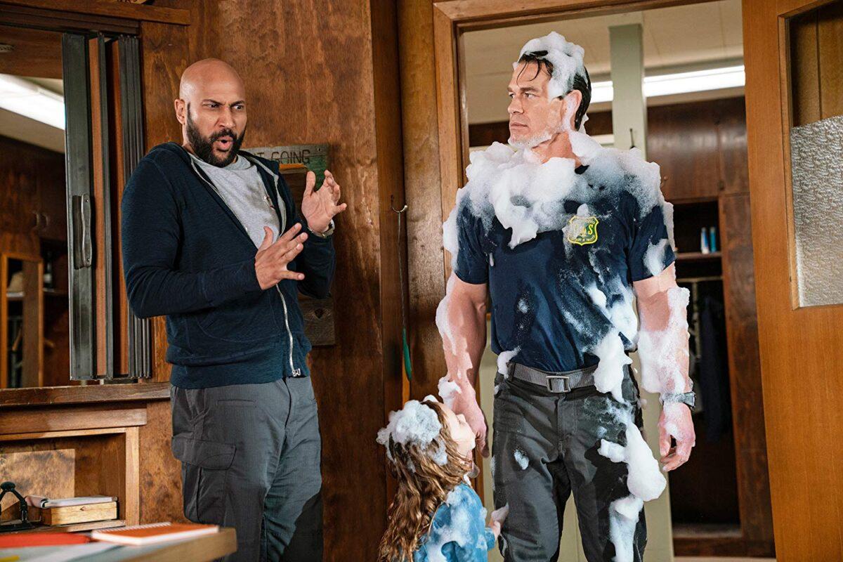 (L–R) Keegan-Michael Key, Finley Rose Slater, and John Cena in "Playing With Fire." (Doane Gregory/Paramount Pictures)
