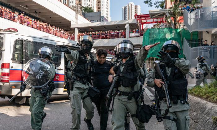 Hong Kong Protesters, Outraged by Death of College Student, Again Clash With Police