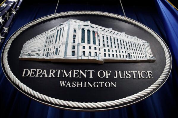 The Department of Justice sign in Washington. (Patrick Semansky/AP Photo)