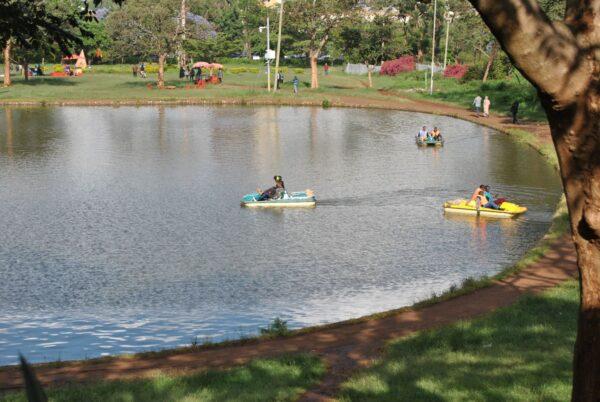 Children and adults enjoy boat rides on a fine afternoon on Uhuru Park's man-made lake. (Dominic Kirui for The Epoch Times)