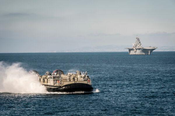 Assault Craft Unit 5 (L) during the 11th Marine Expeditionary Unit’s amphibious offload to Marine Corps Base Camp Pendleton in California.  (U.S. Marine Corps photo by Sgt. Adam Dublinske)