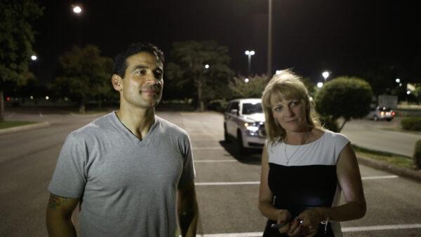 Former Bexar County Criminal District Attorney Nico LaHood with "Vaxxed II: The People’s Truth" executive producer Polly Tommey after signing his allegedly vaccine-injured son’s name, Michael, to the Vaxxed bus. (© Vaxxed II: The People’s Truth)