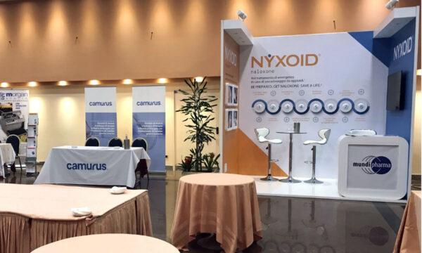 Purdue Pharma’s international affiliate, Mundipharma, promoting Nyxoid, at a medical conference in Italy. (Andrew Kolodny via AP)