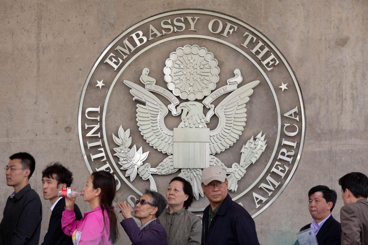 People in line outside the U.S. embassy in Beijing on April 27, 2012. (Ed Jones/AFP/Getty Images)