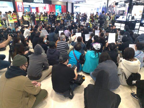 Protesters hold a peaceful sit-in at Yoho Mall in Yuen Long, Hong Kong on Dec. 21, 2019. (Frank Fang/The Epoch Times)