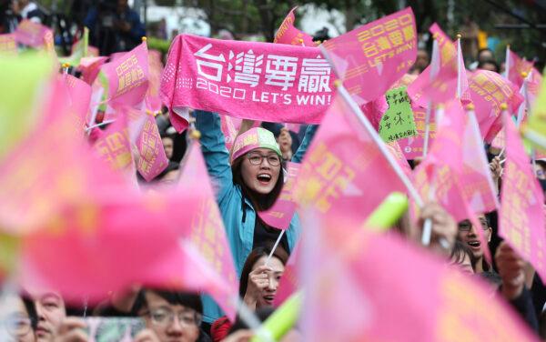 Supporters of Taiwan's presidential election candidate, Taiwan president Tsai Ing-wen cheer for Tsai's victory in Taipei, Taiwan, on Jan. 11, 2020. (AP Photo/Chiang Ying-ying)
