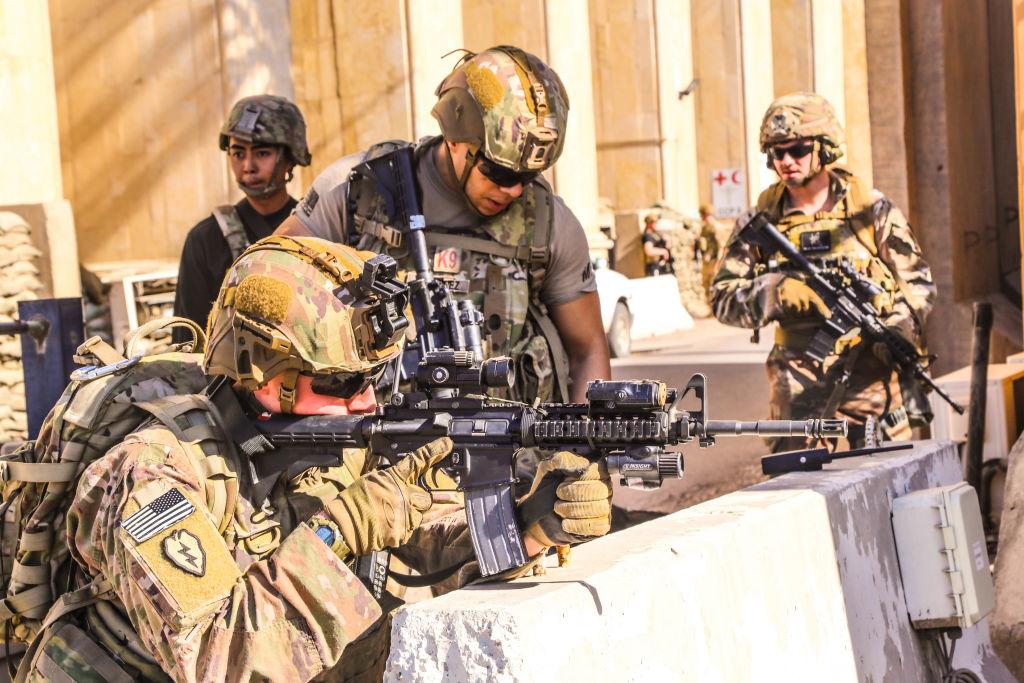 American soldiers taking position around the embassy in the capital Baghdad on Dec. 31, 2019, after supporters and members of the Hashed al-Shaabi military network breached the outer wall of the diplomatic mission during a rally to vent anger over weekend airstrikes that killed pro-Iran fighters in western Iraq. (U.S. Embassy in Iraq/AFP via Getty Images)