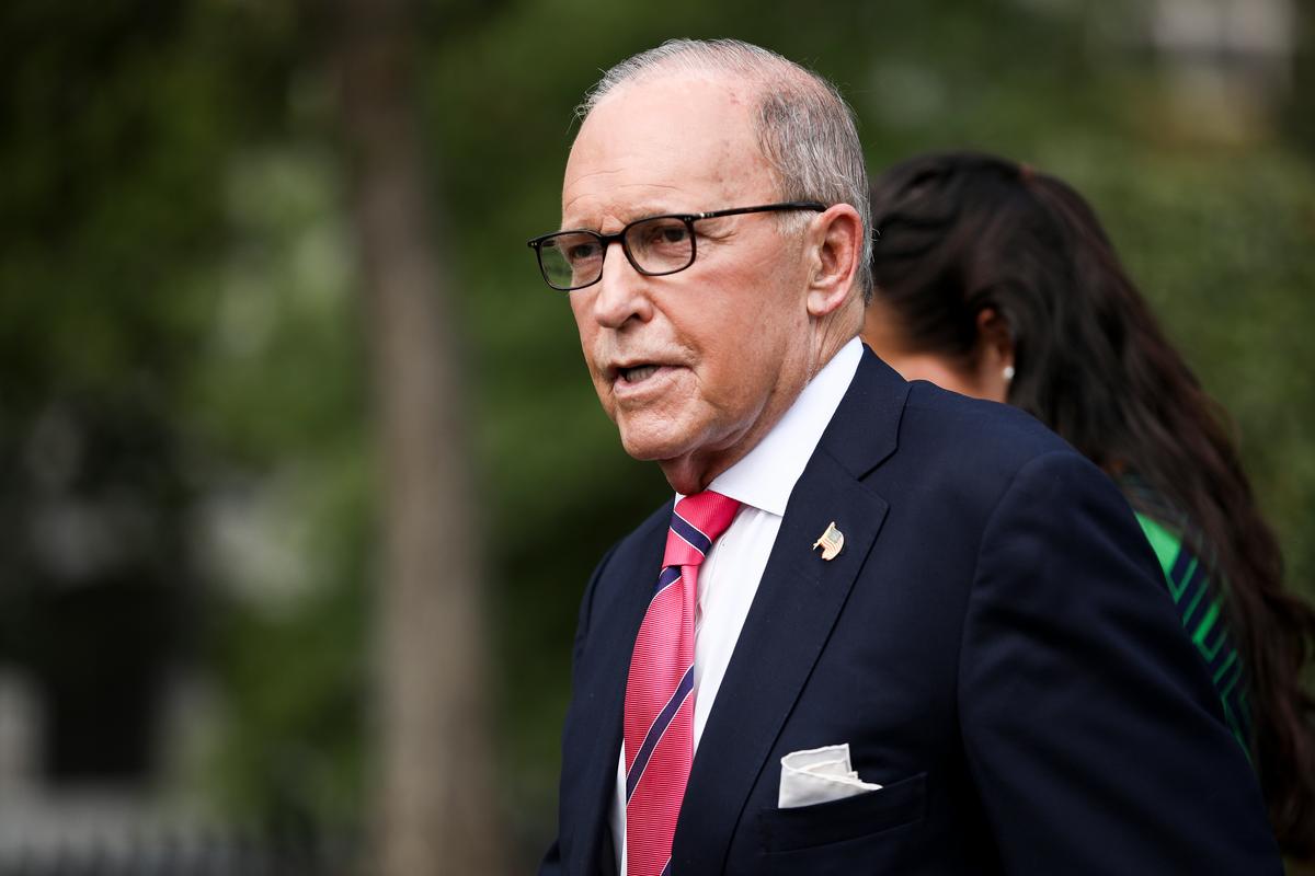 White House economic adviser Larry Kudlow talks to media outside the White House in Washington in a Sept. 26, 2019. (Charlotte Cuthbertson/The Epoch Times)