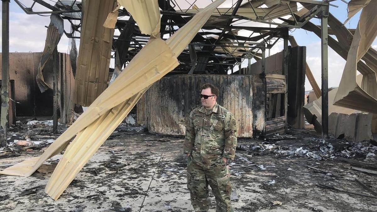 A U.S. soldier stands at a site of Iranian bombing, in Ain al-Asad air base, Anbar, Iraq, on Jan. 13, 2020. (Qassim Abdul-Zahra/AP Photo)