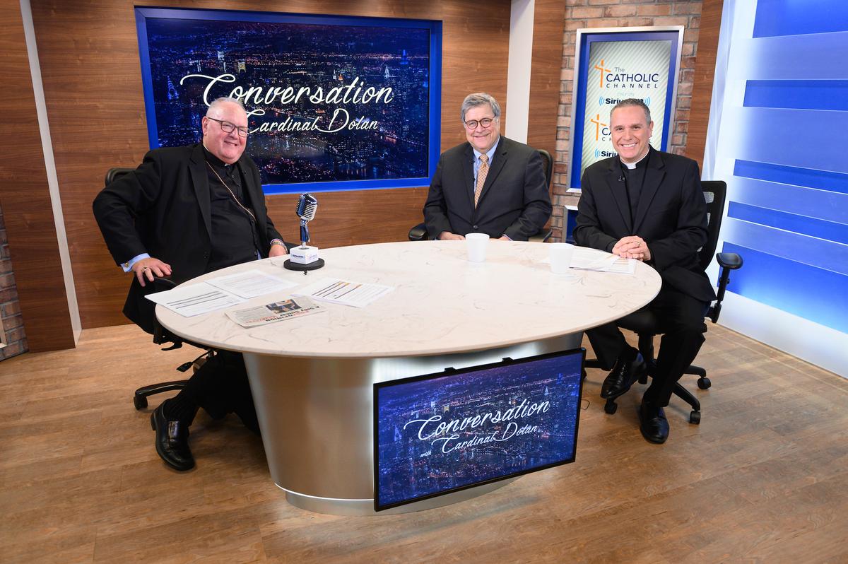 Attorney General William Barr (C) sits down with Cardinal Timothy Dolan (L) and Father Dave Dwyer, CSP (R) at The Catholic Channel's 'Conversation With Cardinal Dolan' on January 28, 2020 in New York City. (Photo by Noam Galai/Getty Images for SiriusXM)