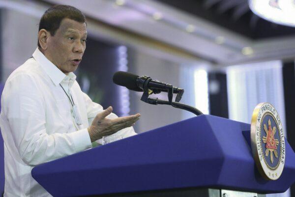 Philippine President Rodrigo Duterte delivers a speech during the 11th Biennial National Convention and 22nd founding anniversary of the Chinese Filipino Business Club, Inc. in Manila, Philippines on Feb. 10, 2020. (Toto Lozano/Malacanang Presidential Photographers Division via AP)