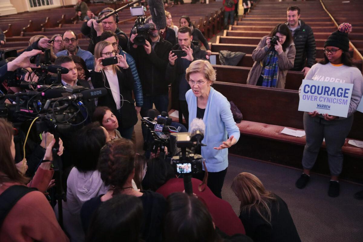Democratic presidential candidate Sen. Elizabeth Warren (D-Mass.) speaks to the press following a town hall at South Church in Plymouth, New Hampshire, on Feb. 10, 2020. (Scott Olsen/Getty Images)