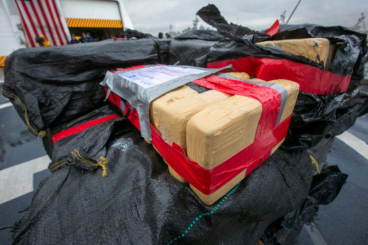 The crew of the Coast Guard Cutter Munro offloaded 20,000 pounds of uncut cocaine seized from known drug-transit zones of the Eastern Pacific Ocean worth approximately $338 million at Naval Station San Diego on Feb. 10, 2020. (John Gibbins/The San Diego Union-Tribune via AP)