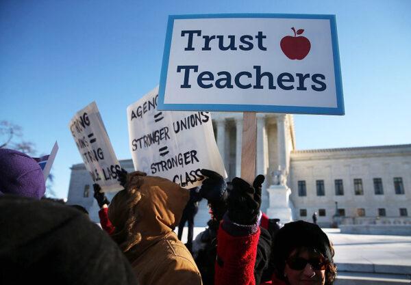 A file photo of California Teachers Association supporters demonstrating in favor of public employees having to pay union dues, in front of the U.S. Supreme Court in Washington, D.C., on Jan. 11, 2016 in Washington, DC. (Mark Wilson/Getty Images)