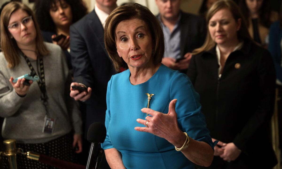 Speaker of the House Rep. Nancy Pelosi (D-Calif.) speaks to members of the media at the Capitol in Washington on March 13, 2020. (Alex Wong/Getty Images)