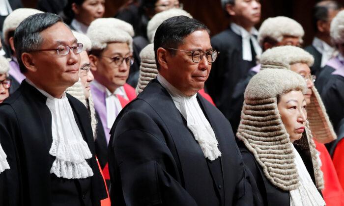 Hong Kong Judges Battle Beijing Over Rule of Law as Pandemic Chills Protests