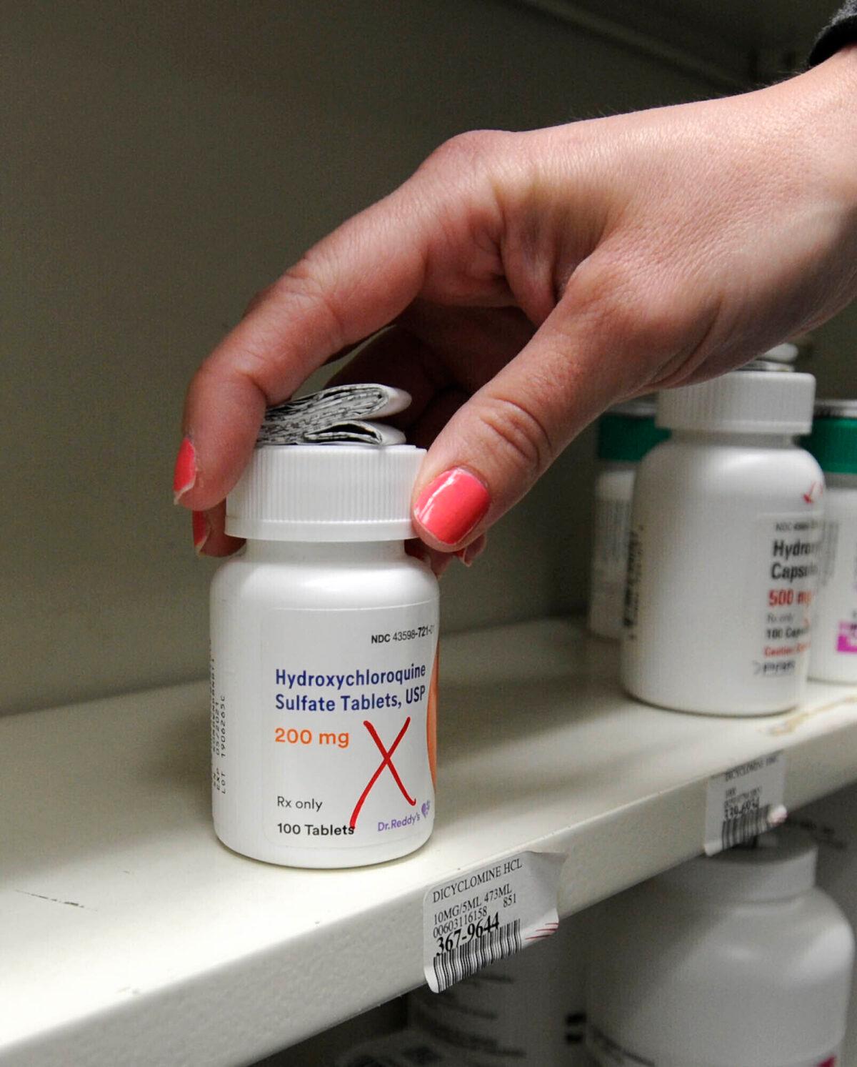 A bottle of Hydroxychloroquine at the Medicine Shoppe in Wilkes-Barre, Pa on March 31, 2020. Some politicians and doctors were sparring over whether to use hydroxychloroquine against the new coronavirus, with many scientists saying the evidence is too thin to recommend it yet. (Mark Moran/The Citizens' Voice via AP)