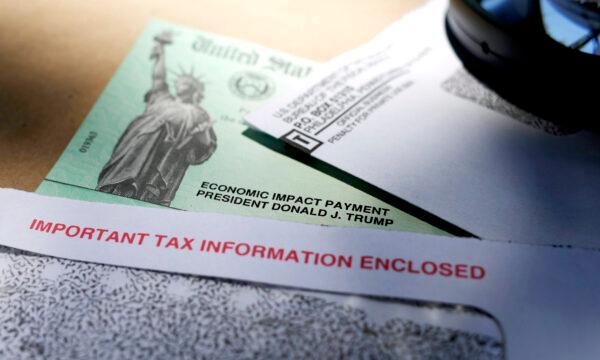 President Donald Trump's name is seen on a stimulus check issued by the IRS to help combat the adverse economic effects of the COVID-19 outbreak, in San Antonio, Texas, on April 23, 2020. (Eric Gay/AP Photo)