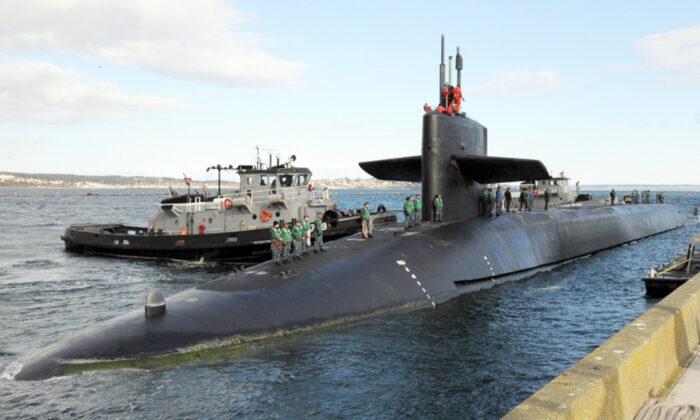 First Filipina US Naval Officer to Earn Submarine Warfare Insignia Boards Submarine USS Ohio