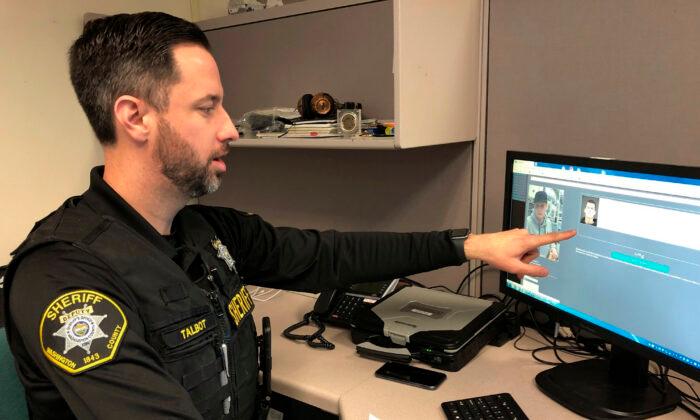 Sheriff's Office Deputy Jeff Talbot demonstrates facial recognition software  in Hillsboro, Ore., on Feb. 22, 2019. (Gillian Flaccus/File/AP Photo)