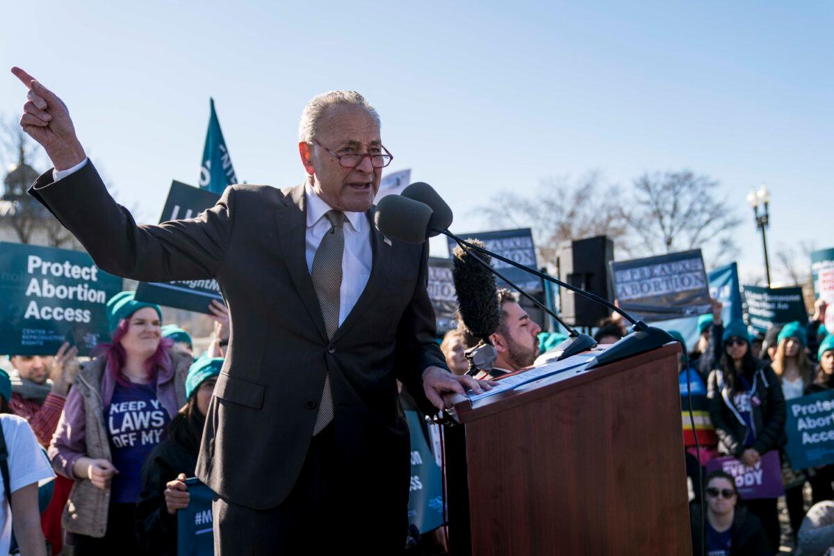 Senate Minority Leader Chuck Schumer (D-N.Y.) speaks in an abortion rights rally outside of the Supreme Court as the justices hear oral arguments in the June Medical Services v. Russo case in Washington on March 4, 2020. (Sarah Silbiger/Getty Images)
