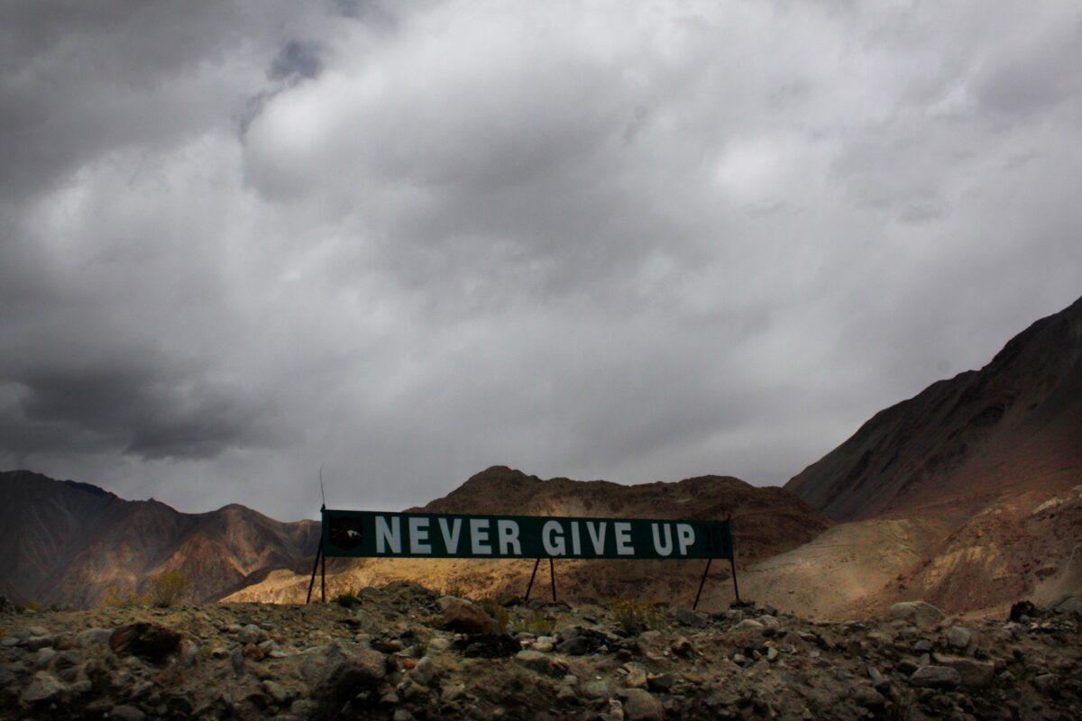 A banner erected by the Indian army stands near Pangong Tso lake near the India China border in India's Ladakh area, on Sept. 14, 2017. (Manish Swarup/ File/AP Photo)