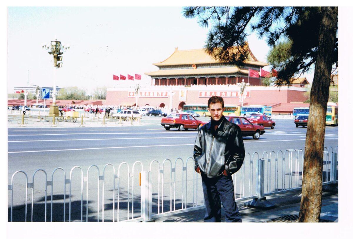 Stuart Martin posing for a photo in Tiananmen Square on March 7, 2002. (Courtesy of Denice Johnson)